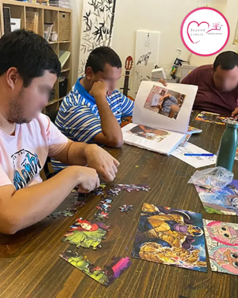 Participants working on a jigsaw puzzle together around a table